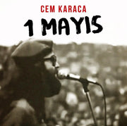 Cem Karaca 1 Mayis LP album cover featuring artist singing into microphone with blurred crowd background