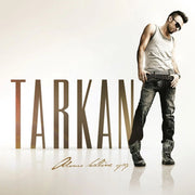 Tarkan standing with sunglasses on white background with Adımı Kalbine Yaz album title and large TARKAN text